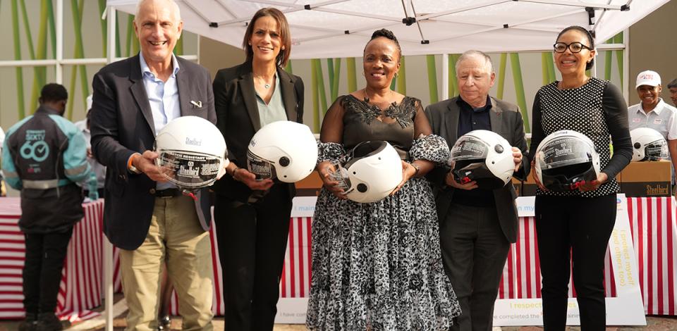 helmets handing out at the TotalEnergies Senderwood service station in Johannesburg - see description hereafter